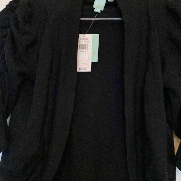 Shrug - Picture 5 of 5